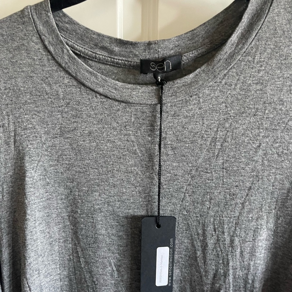 Cute arm cutout top great for afternoon concert or day in park